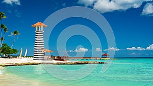 Lighthouse on the beach of the Caribbean, Dominican Republic, Bayahibe - Summer Vacation Concept