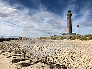 Lighthouse and beach Denmark coastal scene