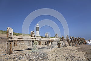 Lighthouse and beach groynes