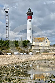 Lighthouse and beach of Ouistreham in France