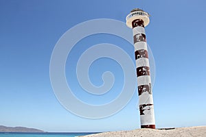 Lighthouse on the beach, Punta Arena de La Ventana, BCS, Mexico photo