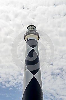 Lighthouse beach scene on ocean shore beautiful landscape scene