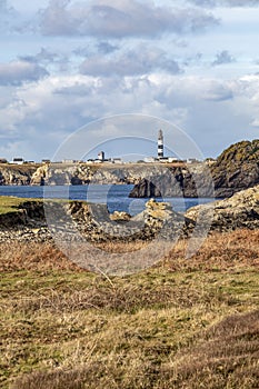 Lighthouse and Beacon of Ouessant, the island of Ushant, in Brittany, french rocky beach in northern France, Finistere