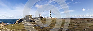 Lighthouse and Beacon of Ouessant, the island of Ushant, in Brittany, french rocky beach in northern France, Finistere