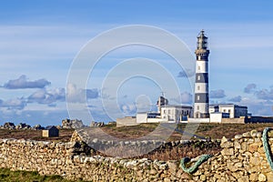 Lighthouse and Beacon of Ouessant, the island of Ushant, in Brittany, french rocky beach in northern France, Finistere