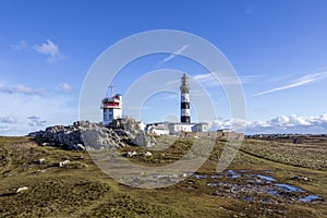 Lighthouse and Beacon of Ouessant, the island of Ushant, in Brittany, french rocky beach in northern France, Finistere