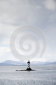 Lighthouse with black and white chequer design