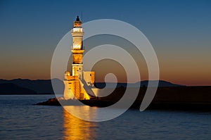 Lighthouse at blue hour photo