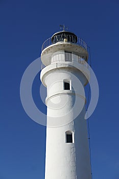 Lighthouse and blue sky in Torrox Costa, Spain photo
