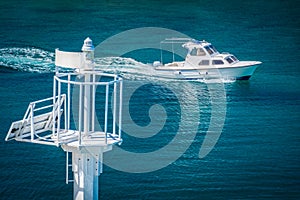 Lighthouse and boat, Adriatic Sea.