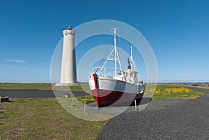 Lighthouse and boat in Iceland