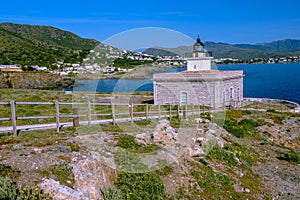 S`Arenella Lighthouse at the Coastline of Mediterranean Sea Catalonia, Spain photo