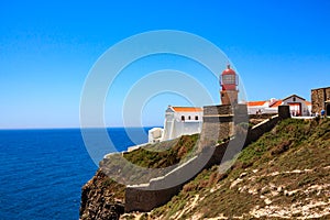 Lighthouse at Cabo de SÃÂ£o Vicente in Portugal photo