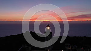 Lighthouse Cabo Espichel at Twilight. Rotating Beam. Portugal. Aerial View