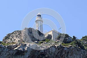 Lighthouse Cabo Nao Cape on rocks mountain