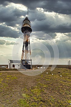 Lighthouse of Cabo Virgenes, Strait of Magellan, Argentina photo