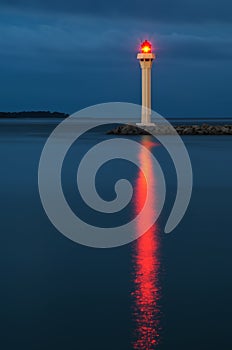 Lighthouse in Cannes at night photo