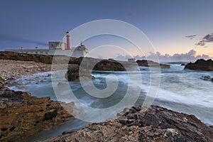 Lighthouse at Cape Cabo Raso, Cascais, Portugal. photo