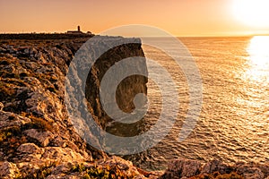 Lighthouse of Cape St. Vincent at sunset. Lagos, Portugal. Algarve region.