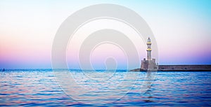 Lighthouse of Chania at pink sunset, Crete