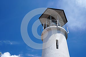 Lighthouse with clear blue sky background at Tang Kuan Mountain Songkhla