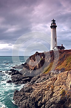 Lighthouse on a cliff and ocean