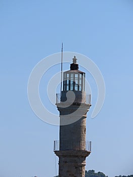 Lighthouse close-up against the blue sky in Chania on the island of Crete.