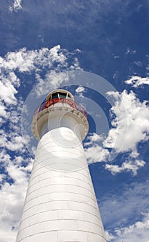 Lighthouse and cloudy sky