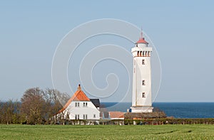 A lighthouse by the coast of Funen photo