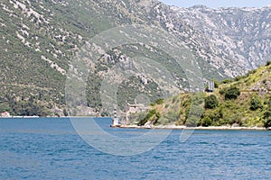 Lighthouse on the coast of Kotor Bay, Montenegro in summer