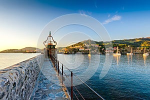 Lighthouse of Collioure harbor at sunrise in France