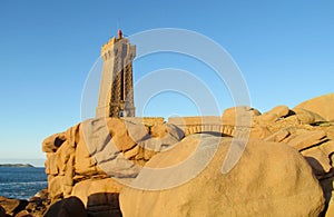 Lighthouse at Cote de Granit Rose, France photo