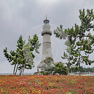 Lighthouse by day. Marine embankment of Weihai, China