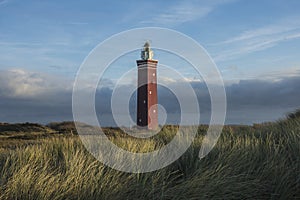 Lighthouse in the dunes of the island of Goeree Overvlakkee