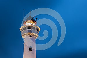 Lighthouse at the Dutch coast in Egmond aan Zee photo
