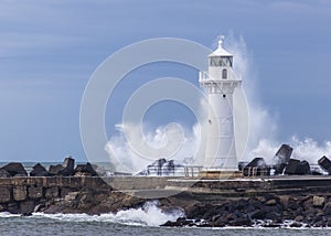 Lighthouse dwarfed