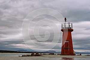 Lighthouse at the end of the breakwater