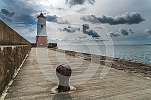 Lighthouse at the end of jetty and seawall, Berwick upon Tweed,