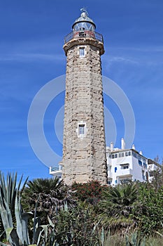 The lighthouse at Estepona in Spain. It stands on the headland known as Punta Doncella at the west end of La Rada beach , close to