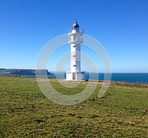 Lighthouse Faro de cabo Ajo, Bareyo, Cantabria, Northern Spain. photo