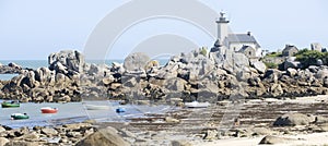 Lighthouse on Finistere beach photo