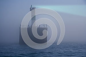 Lighthouse in fog