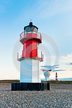 Lighthouse with foghorn and another lighthouse in