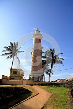 Lighthouse in fort Gale at Sri Lanka seascape