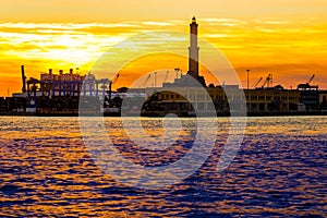 The lighthouse of Genoa called Lanterna at sunset, Italy