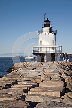 Lighthouse Guiding Mariners and Tour Boats