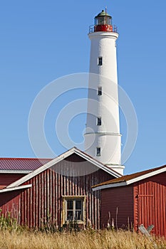 Lighthouse at Hailuoto island. Marjaniemi beach. Finland coastline. Travel