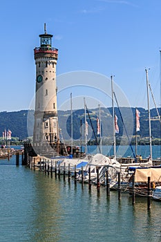 The lighthouse at the harbor entrance of the island Lindau at the Lake Constance in Bavaria, Germany