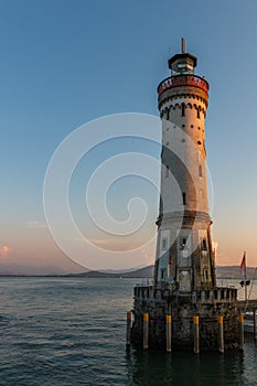 The lighthouse at the harbor entrance of the island Lindau at the Lake Constance in Bavaria, Germany