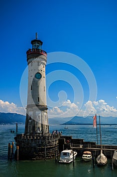 Lighthouse at the harbor entrance in Lindau at Lake Constance Bavaria Germany